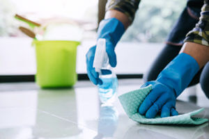 person cleaning the floor for Senior Living Housekeeping Services and maintenance