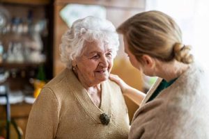 woman-smiling-at-nurse